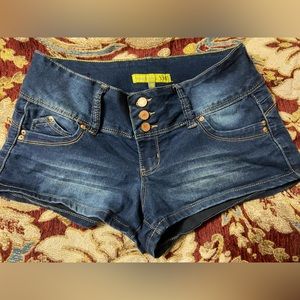 Butt lifting enhancing jean shorts.